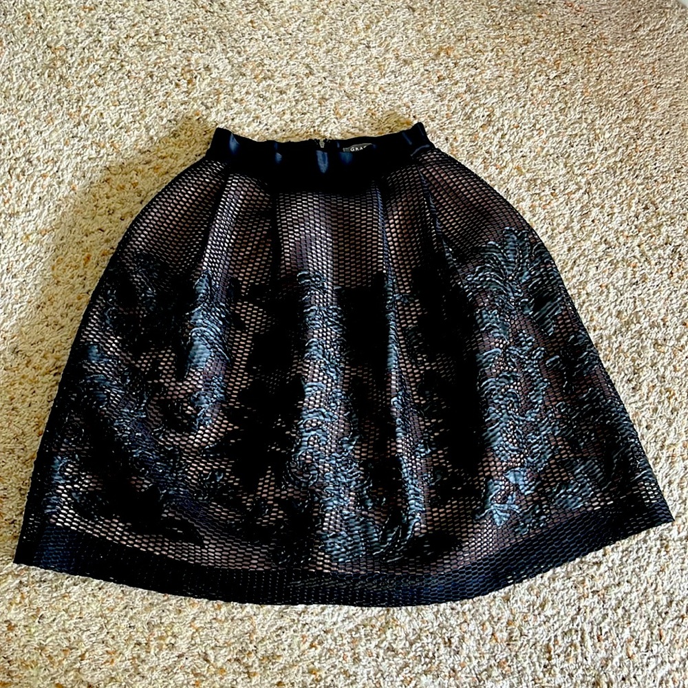 Gracia embroidered black midi skirt.